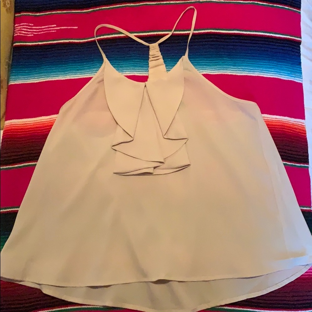 Flowy cream too with front bow like detail